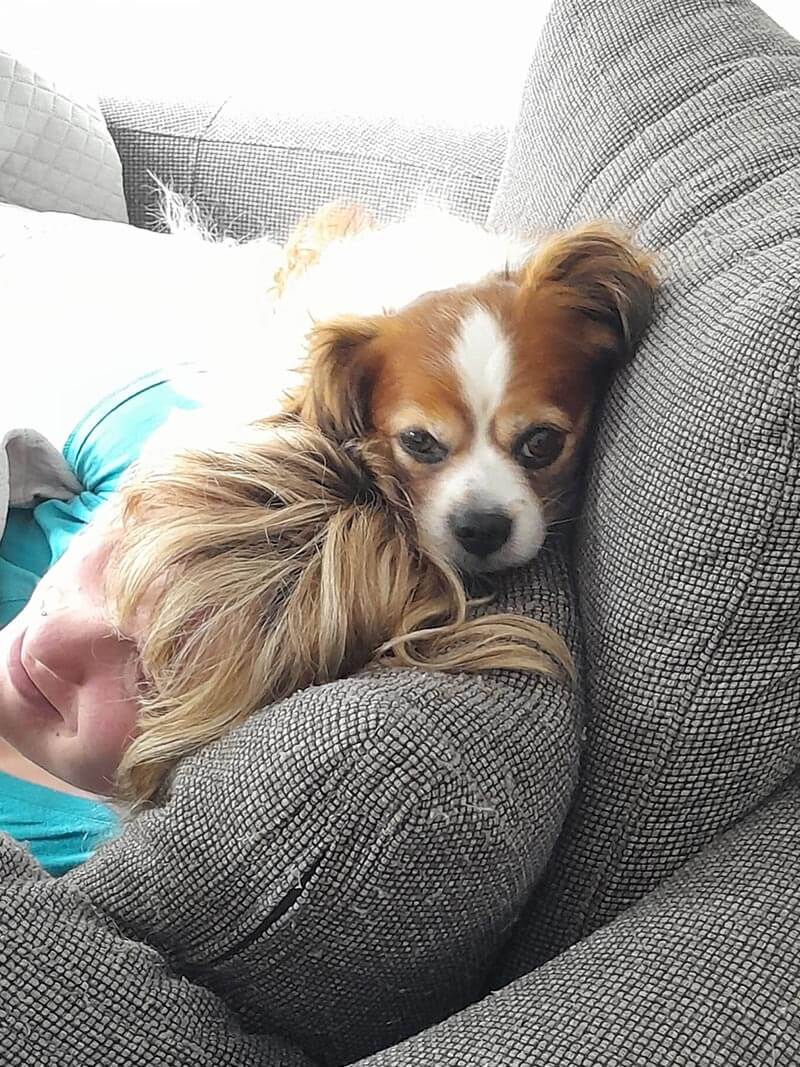 Emma's dog snuggling
